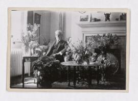 Photograph of William Bell Dawson with flowers, 1920