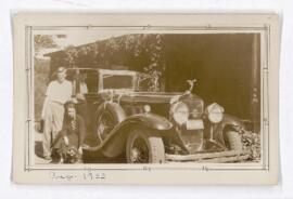 Photograph of J.F. Meakins and sister Diana(?) in front of car